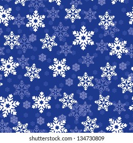 Snowflakes  seamless pattern on blue background