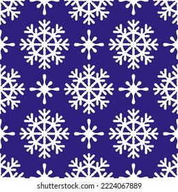 Snowflakes seamless pattern on a purple background. Beautiful  background for Christmas and New Year with snowflakes in cartoon style for a wallpaper, textile print, wrapping paper.