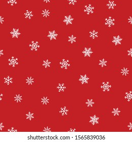 Snowflakes seamless pattern. Vector texture with small hand drawn white snowflakes on red background. Winter holidays theme, Christmas and New Year texture. Simple repeat design for decor, print, web