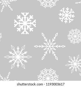 Snowflakes. Seamless pattern. White and gray winter ornament. Background for textile and wallpapers