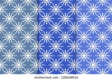 Snowflakes. Seamless patterns. Blue vertical winter ornaments. Backgrounds for textile and wallpapers
