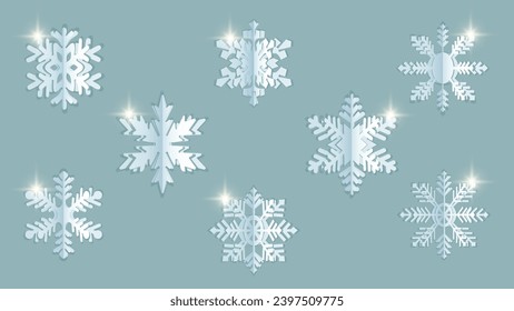 Schneeflocken auf blauem Hintergrund. Acht Schneeflocken auf Papier im Schnittstil für Ihre Designs