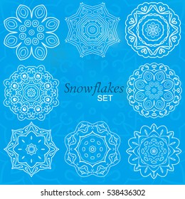 Snowflakes. Set of round ornaments for creativity. Doodle drawing, ethnic motifs. New Year, Christmas