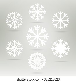 Snowflakes set vector icons. Background for winter and christmas theme. Snowflakes  set flat different shaped. Snowflake symbol, badge white color 