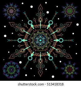 Snowflakes set. Vector sketch with green and violet snowflakes on black background.