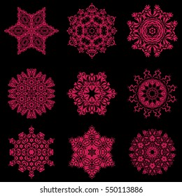 Snowflakes set. Vector sketch with magenta snowflakes on black background.