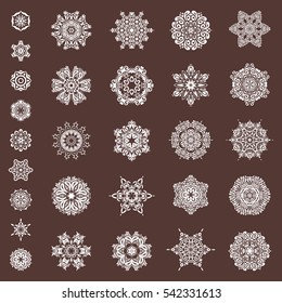 Snowflakes set. Vector sketch with snowflakes on a brown background.