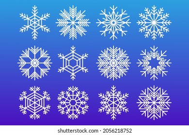 Snowflakes. Set of winter new year and christmas snowflakes of white color on a blue background.
