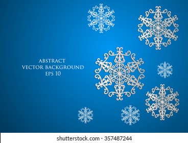 snowflakes with shadow on a blue background. 