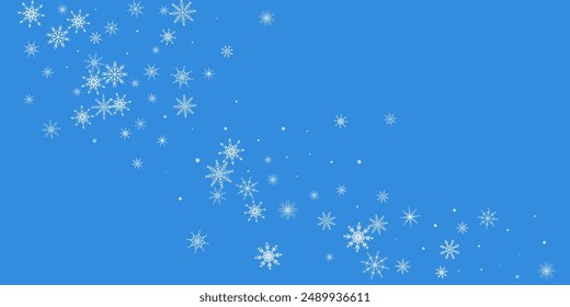 Snowflakes. Snow, snowfall. Falling scattered white snowflakes on a blue background.
