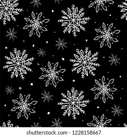 Snowflakes. Snow winter. Seamless vector pattern. Hand linear cartoon drawing on black background.