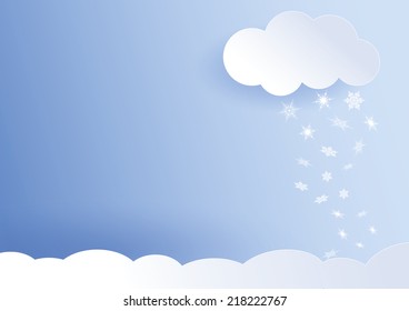 snowflakes snowing from cloud over snow covered ground blue sky