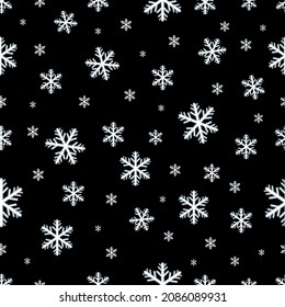 Schneeflocken, Textur auf schwarzem Hintergrund.