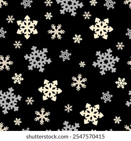 Snowflakes in various shapes and sizes create a decorative Christmas holiday pattern on a dark background