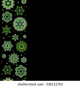 Snowflakes winter New Year frame in white and green colors with copy space (place for your text).