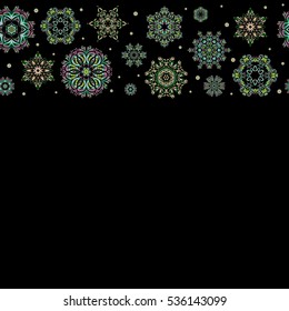 Snowflakes winter New Year frame in green and brown colors with copy space (place for your text).