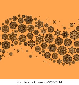 Snowflakes winter New Year frame on orange background.