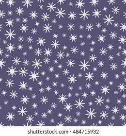 It is snowing in the festive night. Seamless pattern with snowflakes