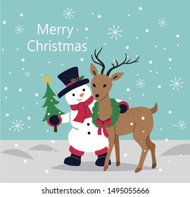 Snowman with deer in winter snow