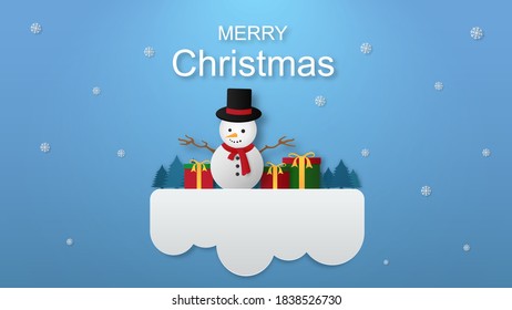 Snowman with gift box in winter snow. Christmas season and Happy new year season