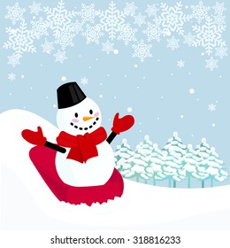 Snowman playing in sled
