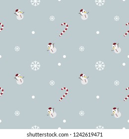 Snowman seamless pattern with candycane snowflakes and now on the blue background