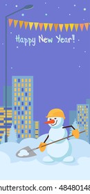 Snowman with shovel in evening city