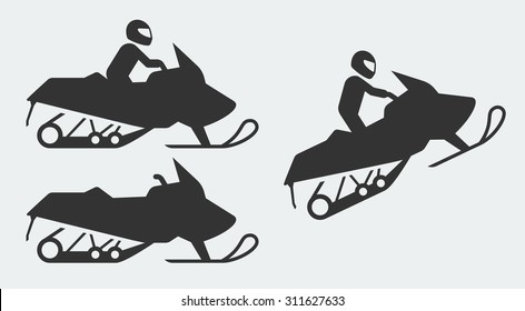 Snowmobiling silhouettes on gray background