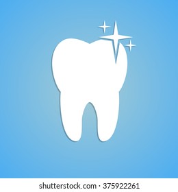 Snow-white tooth on a blue background