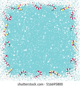 Snowy Christmas Background with candy canes frame