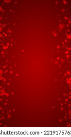 Snowy christmas background. Subtle flying snow flakes and stars on christmas red background. Delicate sweet snowy christmas. Vertical vector illustration.