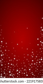 Snowy christmas background. Subtle flying snow flakes and stars on christmas red background. Delicate sweet snowy christmas. Vertical vector illustration.