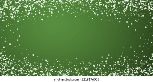 Snowy christmas background. Subtle flying snow flakes and stars on christmas green background. Delicate sweet snowy christmas. Wide vector illustration.