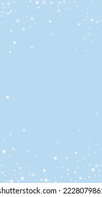 Snowy christmas background. Subtle flying snow flakes and stars on light blue winter backdrop. Delicate sweet snowy christmas. Vertical vector illustration.