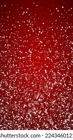 Snowy christmas background. Subtle flying snow flakes and stars on christmas red background. Delicate sweet snowy christmas. Vertical vector illustration.