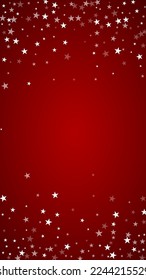 Snowy christmas background. Subtle flying snow flakes and stars on christmas red background. Delicate sweet snowy christmas. Vertical vector illustration.