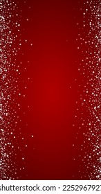 Snowy christmas background. Subtle flying snow flakes and stars on christmas red background. Delicate sweet snowy christmas. Vertical vector illustration.