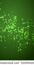 Snowy christmas background. Subtle flying snow flakes and stars on christmas green background. Delicate sweet snowy christmas. Vertical vector illustration.