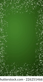 Snowy christmas background. Subtle flying snow flakes and stars on christmas green background. Delicate sweet snowy christmas. Vertical vector illustration.