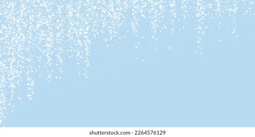 Snowy christmas background. Subtle flying snow flakes and stars on light blue winter backdrop. Delicate sweet snowy christmas. Wide vector illustration.