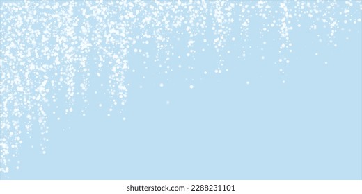 Snowy christmas background. Subtle flying snow flakes and stars on light blue winter backdrop. Delicate sweet snowy christmas. Wide vector illustration.