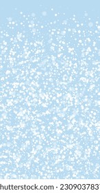 Snowy christmas background. Subtle flying snow flakes and stars on light blue winter backdrop. Delicate sweet snowy christmas. Vertical vector illustration.