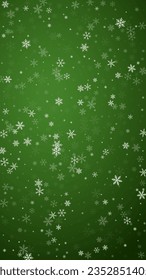 Snowy christmas background. Subtle flying snow flakes and stars on christmas green background. Delicate sweet snowy christmas. Vertical vector illustration.