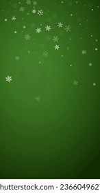 Snowy christmas background. Subtle flying snow flakes and stars on christmas green background. Delicate sweet snowy christmas. Vertical vector illustration.