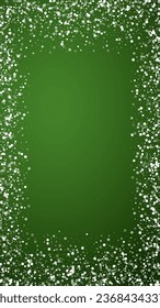 Snowy christmas background. Subtle flying snow flakes and stars on christmas green background. Delicate sweet snowy christmas. Vertical vector illustration.