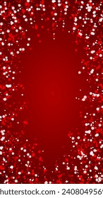 Snowy christmas background. Subtle flying snow flakes and stars on christmas red background. Delicate sweet snowy christmas. Vertical vector illustration.