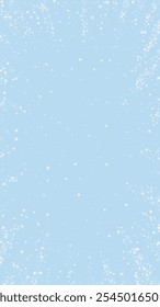 Snowy christmas background. Subtle flying snow flakes and stars on light blue winter backdrop. Delicate sweet snowy christmas. Vertical vector illustration.