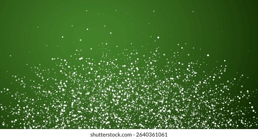 Snowy christmas background. Subtle flying snow flakes and stars on christmas green background. Delicate sweet snowy christmas. Wide vector illustration.