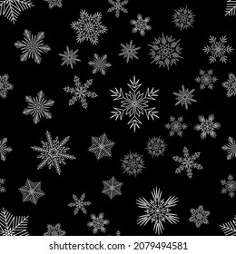 Snowy Christmas seamless pattern on a dark background, white crystal snowflake for textiles