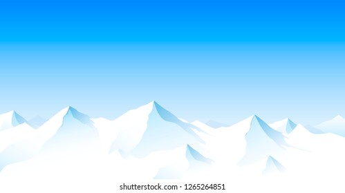 Snowy mountain peaks against the blue sky. Mountain snow landscape.